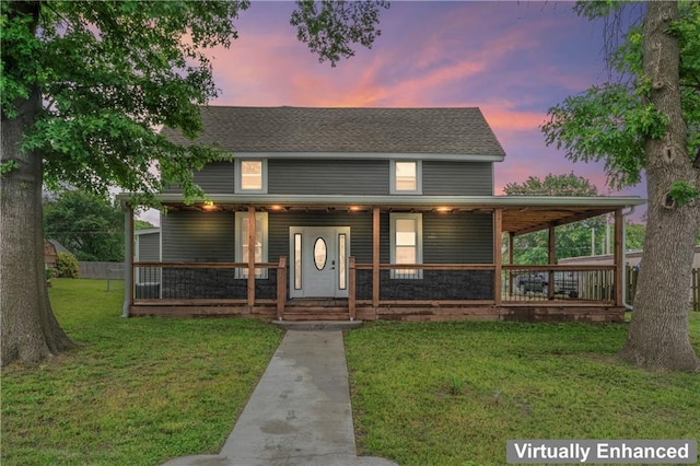 1105 S Gordon St, Concordia, MO 64020 - farmhouse featuring a porch, a front yard, and roof with shingles