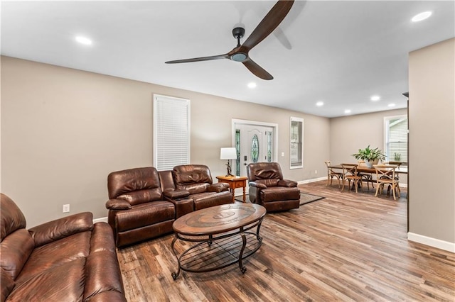 1105 S Gordon St, Concordia, MO 64020 - living room with a ceiling fan, baseboards, wood finished floors, and recessed lighting