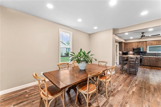 1105 S Gordon St, Concordia, MO 64020 - dining space with dark wood-type flooring, recessed lighting, ceiling fan, and baseboards