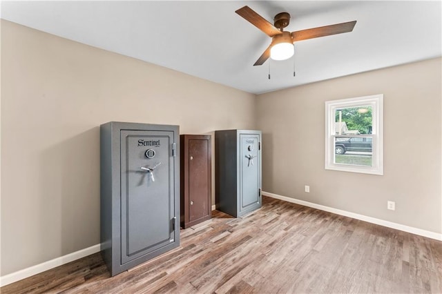1105 S Gordon St, Concordia, MO 64020 - empty room featuring light wood-style floors, baseboards, and a ceiling fan