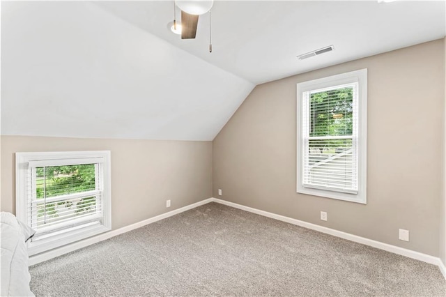 1105 S Gordon St, Concordia, MO 64020 - bonus room featuring vaulted ceiling, baseboards, carpet, and ceiling fan