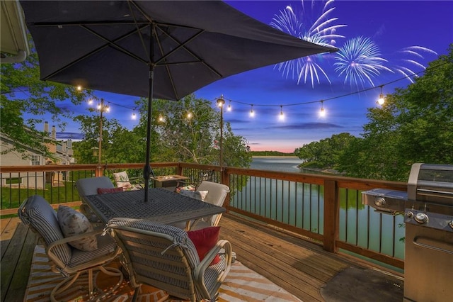 218 NE Bayview Dr, Lees Summit, MO 64064 - deck with a water view and outdoor dining space