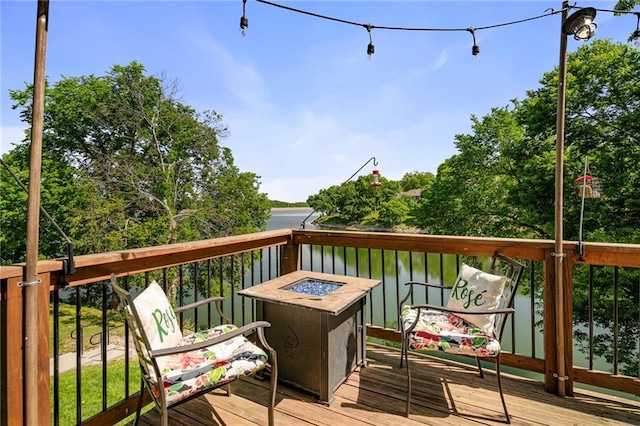 218 NE Bayview Dr, Lees Summit, MO 64064 - deck with an outdoor fire pit
