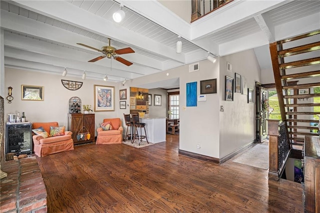 218 NE Bayview Dr, Lees Summit, MO 64064 - living room with track lighting, wood finished floors, beam ceiling, and plenty of natural light