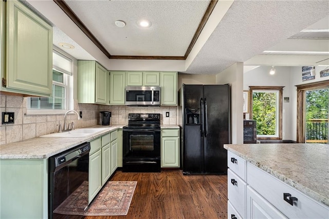 218 NE Bayview Dr, Lees Summit, MO 64064 - kitchen featuring black appliances, green cabinetry, a sink, a textured ceiling, and dark wood-style flooring