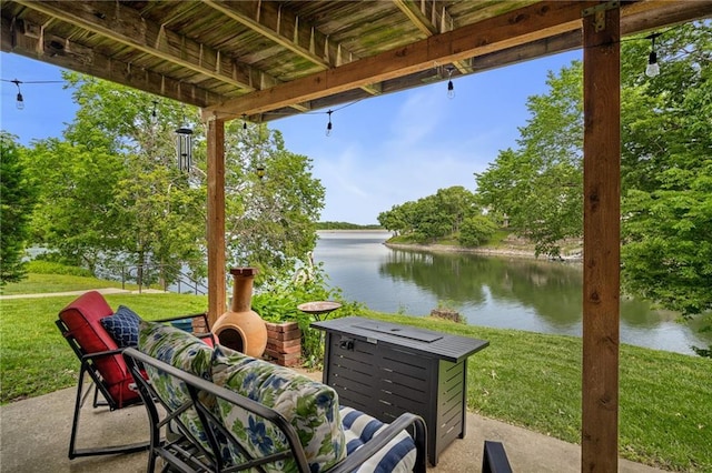 218 NE Bayview Dr, Lees Summit, MO 64064 - view of patio with a water view