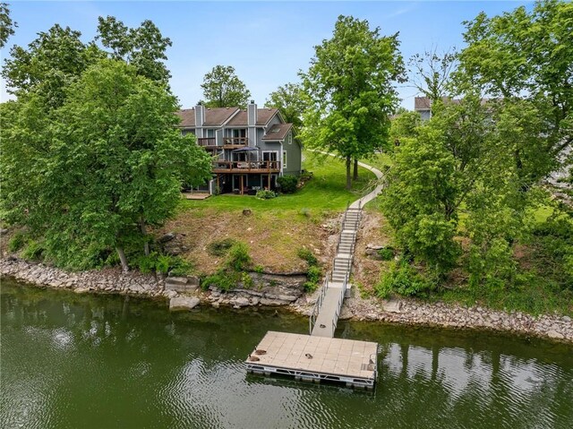 218 NE Bayview Dr, Lees Summit, MO 64064 - rear view of house featuring a water view