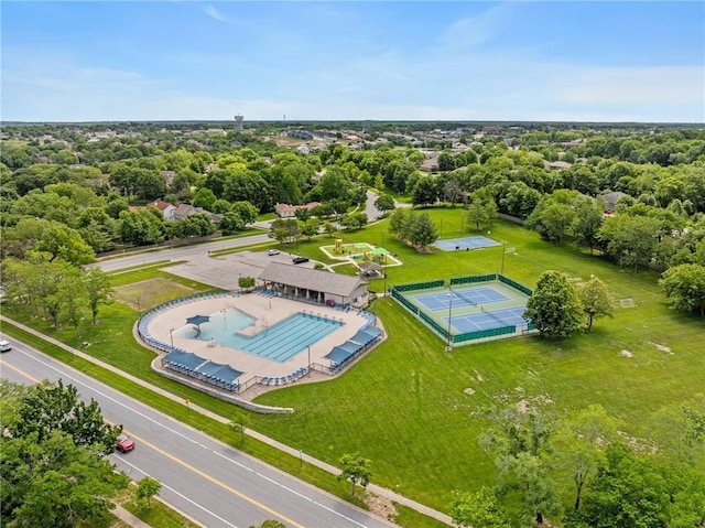 218 NE Bayview Dr, Lees Summit, MO 64064 - bird's eye view of a pool and a tree filled landscape