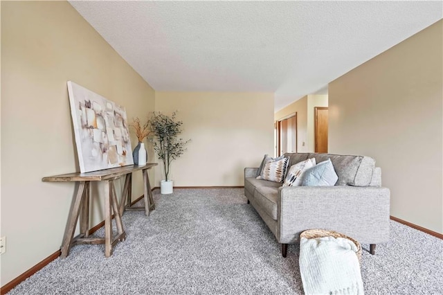 1109 Jeff Cir, Paola, KS 66071 - living room featuring light carpet, a textured ceiling, and baseboards