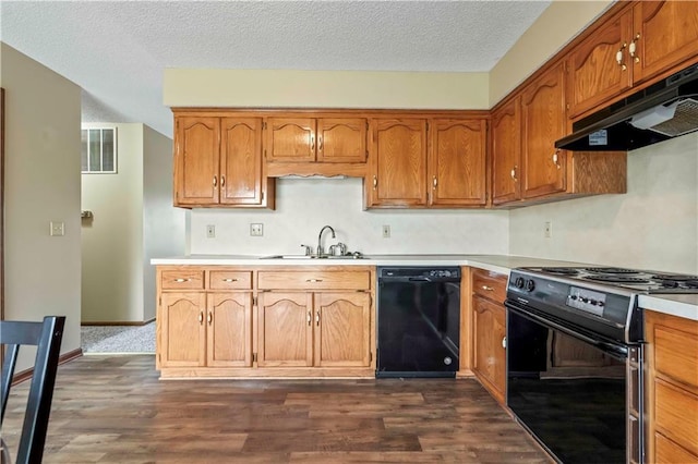 1109 Jeff Cir, Paola, KS 66071 - kitchen with black appliances, under cabinet range hood, a sink, light countertops, and a textured ceiling