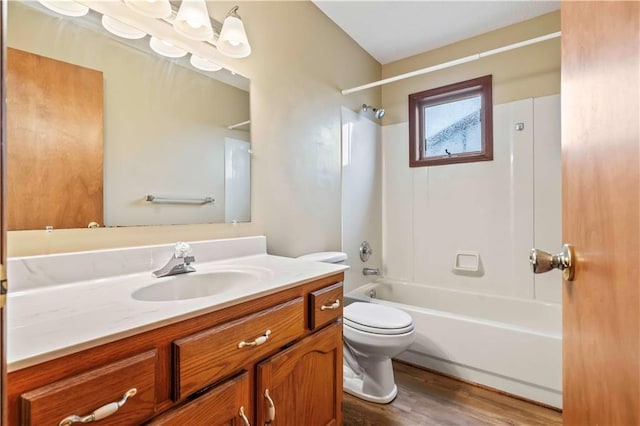 1109 Jeff Cir, Paola, KS 66071 - full bath with vanity, bathing tub / shower combination, toilet, and wood finished floors
