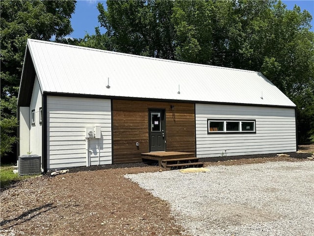 258 Sycamore Dr, Linn Valley, KS 66040 - view of front facade with a metal roof and a garage