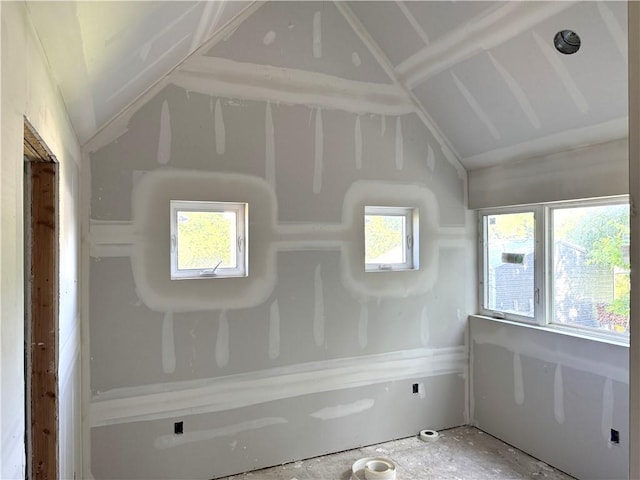 258 Sycamore Dr, Linn Valley, KS 66040 - unfurnished sunroom with vaulted ceiling and healthy amount of natural light