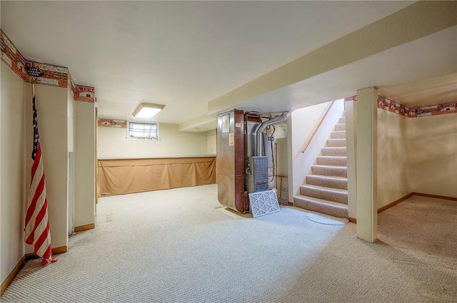 8713 Old Stagecoach Rd, Kansas City, MO 64154 - basement with carpet floors, baseboards, stairs, and heating unit