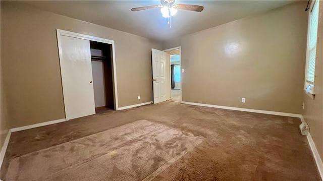 1445 E 77th St, Kansas City, MO 64131 - unfurnished bedroom featuring carpet, a closet, and ceiling fan
