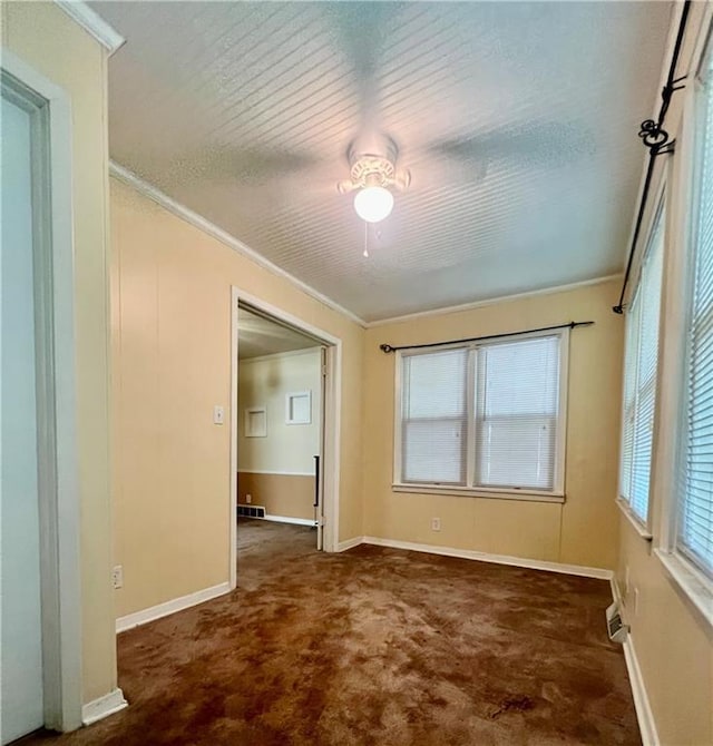 1445 E 77th St, Kansas City, MO 64131 - carpeted empty room with ornamental molding