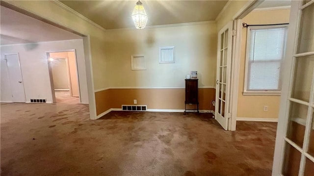 1445 E 77th St, Kansas City, MO 64131 - carpeted spare room with french doors and crown molding