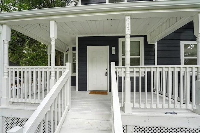 602 N College St, Richmond, MO 64085 - view of exterior entry featuring a porch