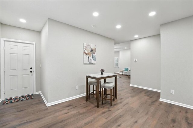 602 N College St, Richmond, MO 64085 - dining space featuring wood finished floors and recessed lighting