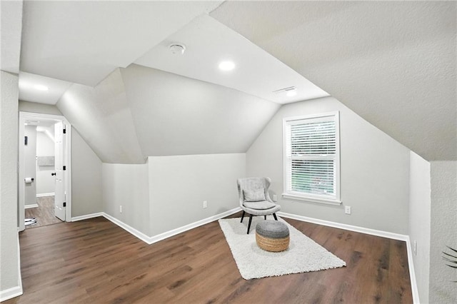 602 N College St, Richmond, MO 64085 - unfurnished room featuring wood finished floors and lofted ceiling