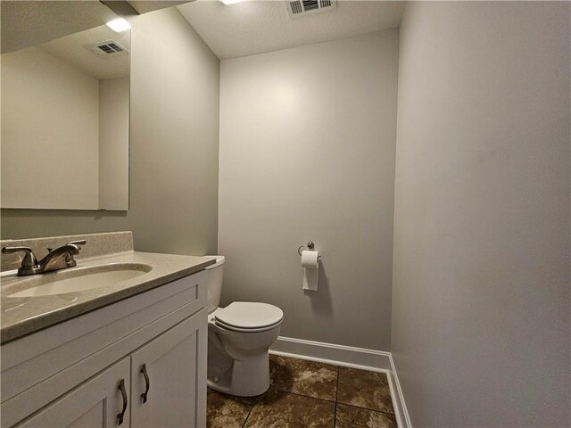 4513 Alpha Ln, Saint Joseph, MO 64506 - half bathroom with vanity, toilet, and baseboards