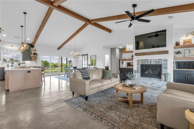 2363 Bainbridge Rd, Bates City, MO 64011 - living area featuring a ceiling fan, beam ceiling, concrete floors, a brick fireplace, and high vaulted ceiling
