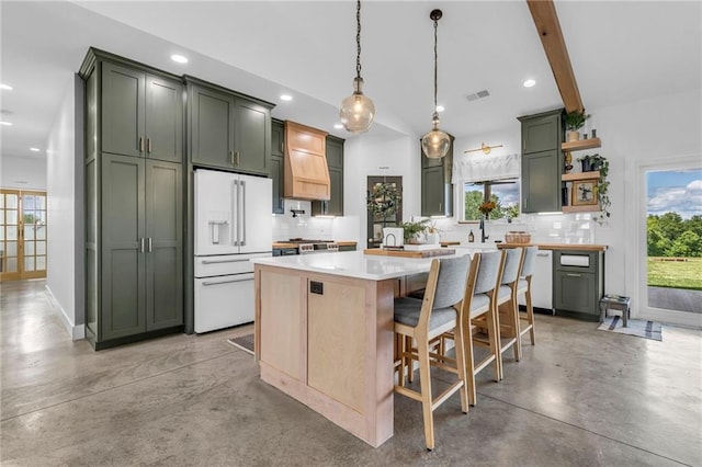 2363 Bainbridge Rd, Bates City, MO 64011 - kitchen with white appliances, green cabinetry, finished concrete floors, tasteful backsplash, and recessed lighting