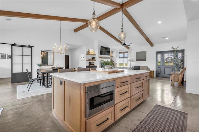 2363 Bainbridge Rd, Bates City, MO 64011 - kitchen with stainless steel microwave, ceiling fan, light brown cabinets, a barn door, and recessed lighting
