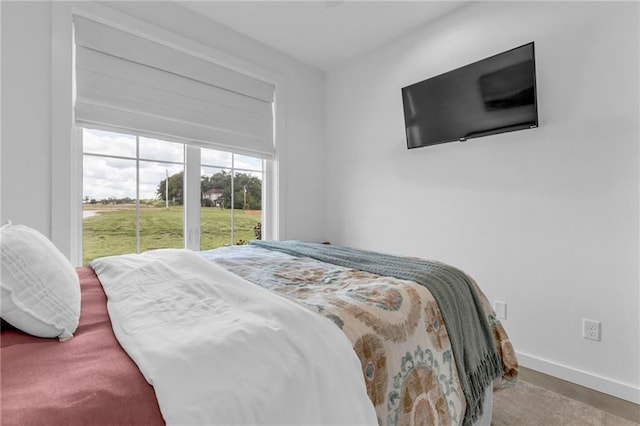 2363 Bainbridge Rd, Bates City, MO 64011 - bedroom featuring baseboards