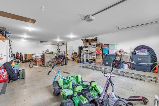 2363 Bainbridge Rd, Bates City, MO 64011 - garage featuring a garage door opener