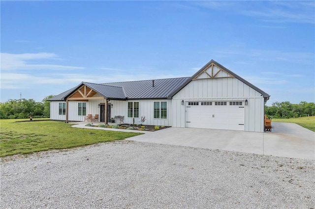 2363 Bainbridge Rd, Bates City, MO 64011 - modern inspired farmhouse featuring board and batten siding, a garage, concrete driveway, and a front lawn