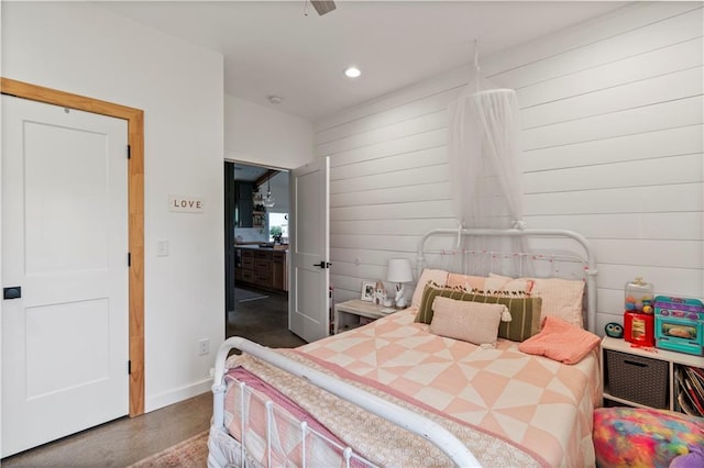 2363 Bainbridge Rd, Bates City, MO 64011 - bedroom with recessed lighting, wood walls, and baseboards