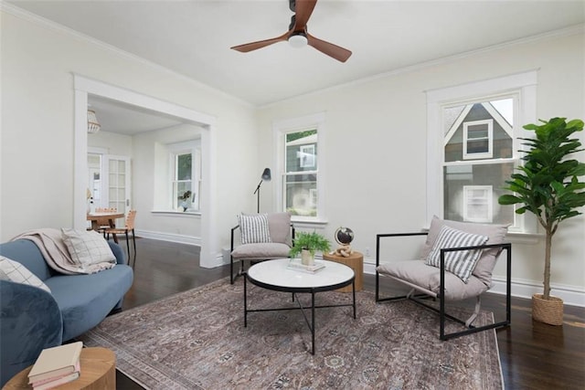 1795 S Norwood Ave, Independence, MO 64052 - sitting room featuring wood finished floors, ceiling fan, baseboards, and ornamental molding