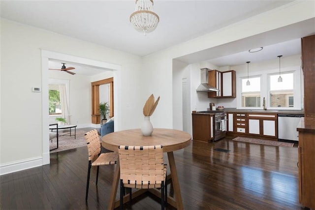 1795 S Norwood Ave, Independence, MO 64052 - dining room with plenty of natural light, dark wood-type flooring, baseboards, and a chandelier