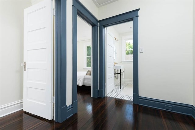1795 S Norwood Ave, Independence, MO 64052 - empty room with dark wood-style floors and baseboards
