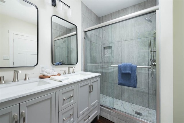 1795 S Norwood Ave, Independence, MO 64052 - bathroom featuring a stall shower and double vanity
