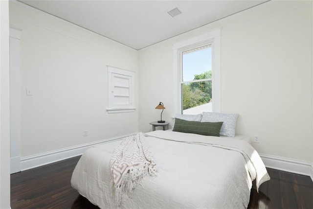 1795 S Norwood Ave, Independence, MO 64052 - bedroom featuring wood finished floors and baseboards