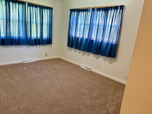 22025 Ness Rd, Parsons, KS 67357 - empty room featuring carpet and baseboards