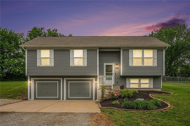 5862 SW Reed Ln, Trimble, MO 64492 - split foyer home featuring concrete driveway and a garage