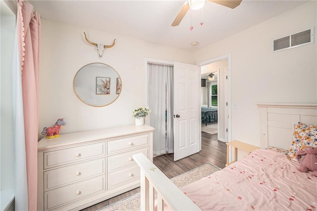 5862 SW Reed Ln, Trimble, MO 64492 - bedroom with wood finished floors, ceiling fan, and baseboards