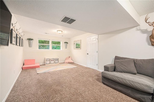 5862 SW Reed Ln, Trimble, MO 64492 - playroom featuring carpet flooring, a textured ceiling, and baseboards