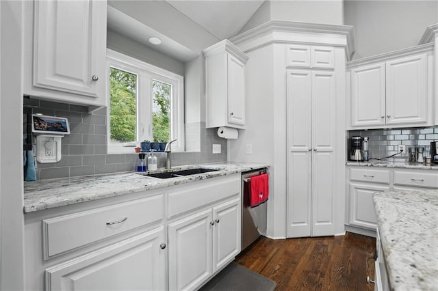 1106 E 14th St, Kearney, MO 64060 - kitchen with a sink, dishwasher, tasteful backsplash, white cabinetry, and dark wood finished floors
