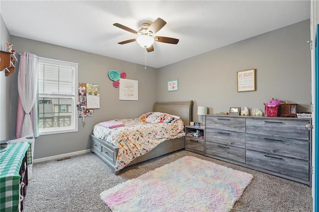 1106 E 14th St, Kearney, MO 64060 - bedroom with carpet floors, baseboards, and a ceiling fan