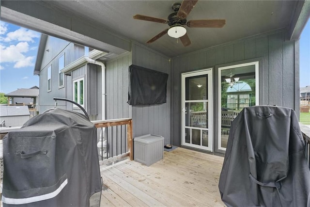 1106 E 14th St, Kearney, MO 64060 - deck with a ceiling fan and a grill