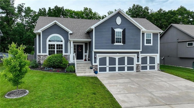 1106 E 14th St, Kearney, MO 64060 - view of front facade with stone siding, a garage, and a front yard