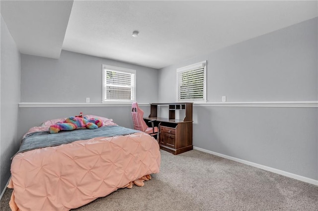 1018 S Elm St, Ottawa, KS 66067 - bedroom featuring carpet flooring and baseboards