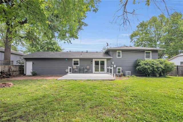 1018 S Elm St, Ottawa, KS 66067 - back of property with cooling unit and a deck