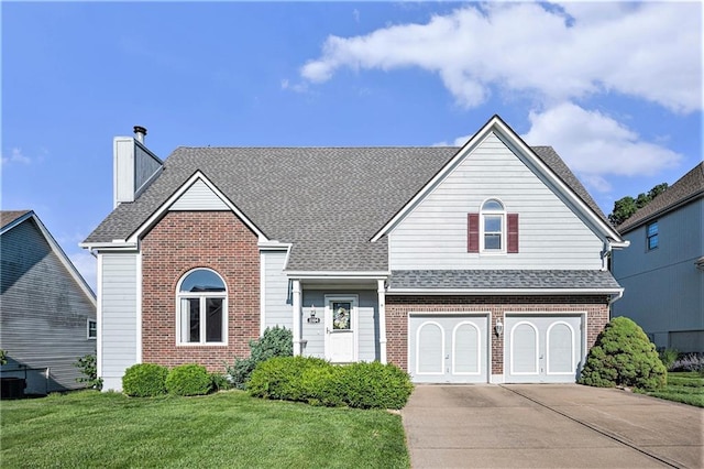 3304 Tepee Ct, Independence, MO 64057 - traditional home featuring brick siding, driveway, and a front yard
