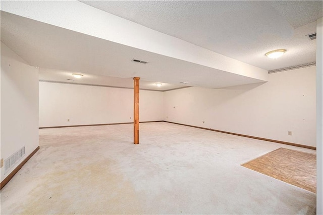 3304 Tepee Ct, Independence, MO 64057 - finished below grade area with carpet flooring, baseboards, and a textured ceiling