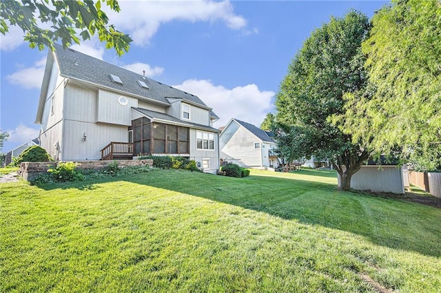 3304 Tepee Ct, Independence, MO 64057 - rear view of property with a sunroom and roof with shingles